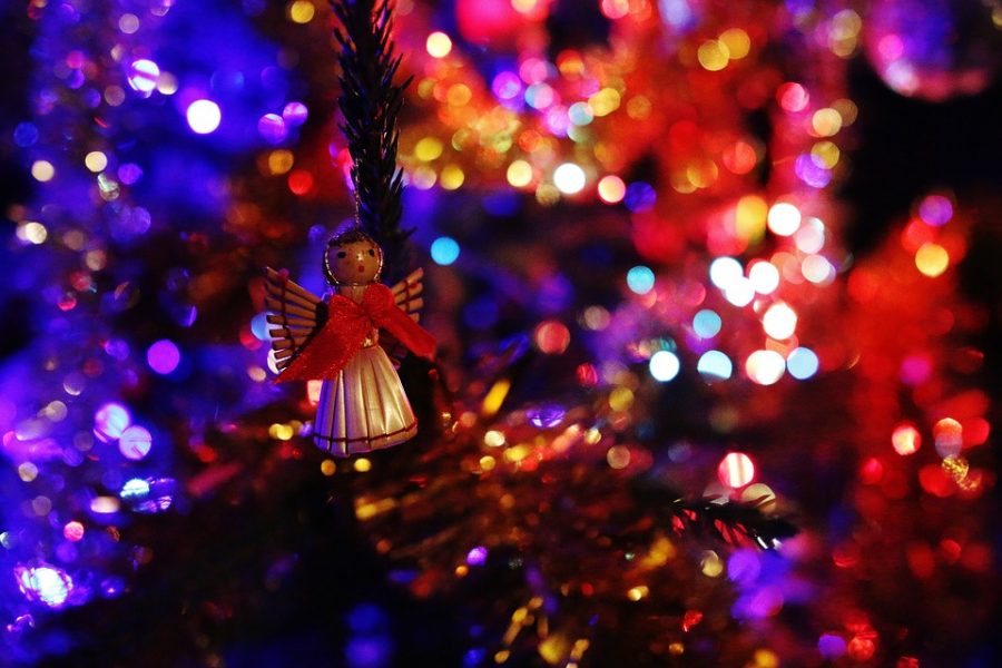 An angel decoration in a Christmas tree