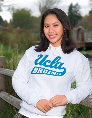 Junior Fay Lustria verbally commits to swim at UCLA after graduation.