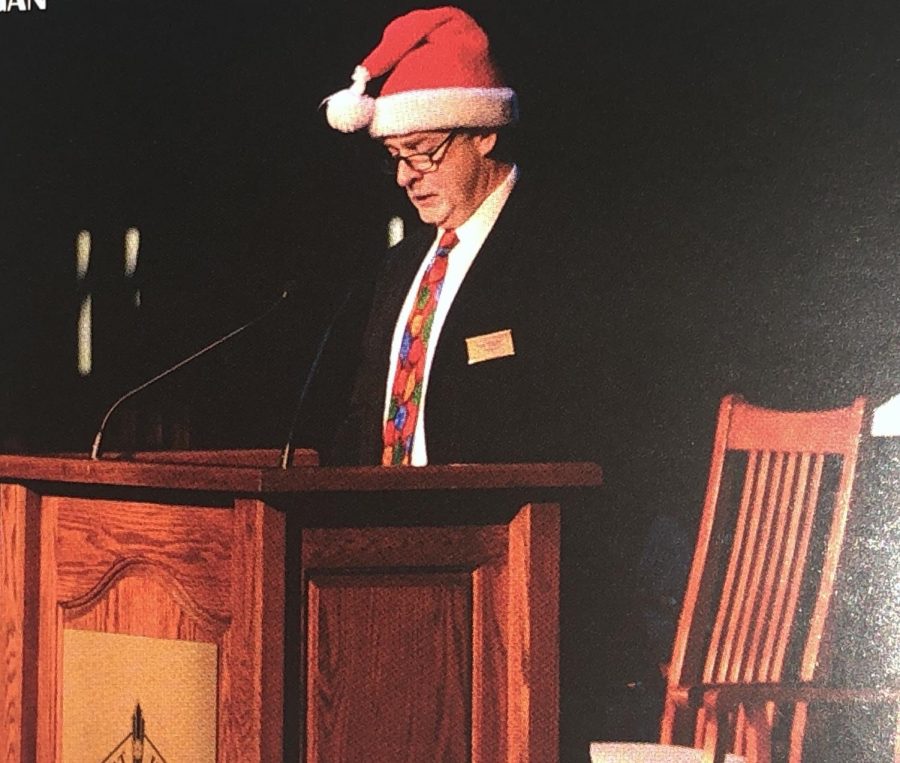 Mr. Hogan addressing the student body at the Christmas Mass. Courtesy of Jesuit’s 2018 yearbook. 
