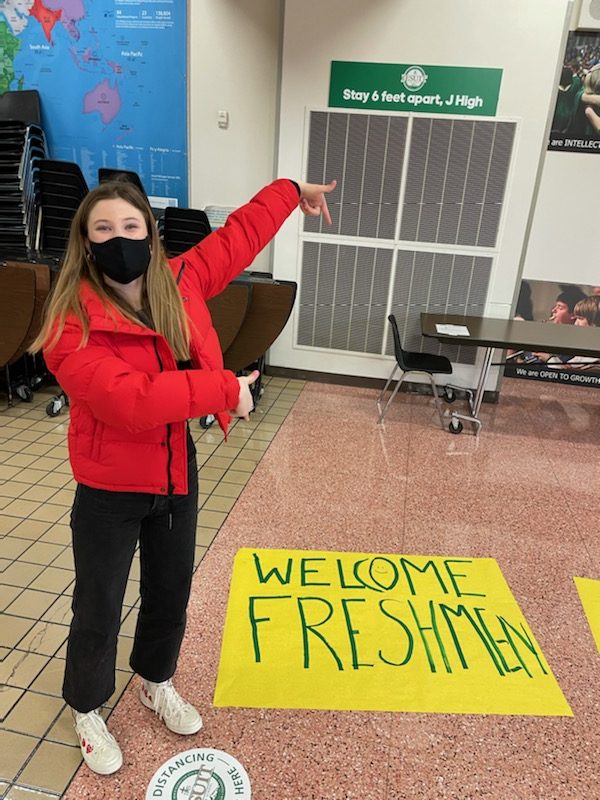 Sophomore Student Government member Catie Dice creating a Welcome Freshman poster during class