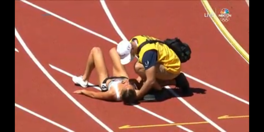 Mr. Gillespie helping an injured athlete in the Olympics.