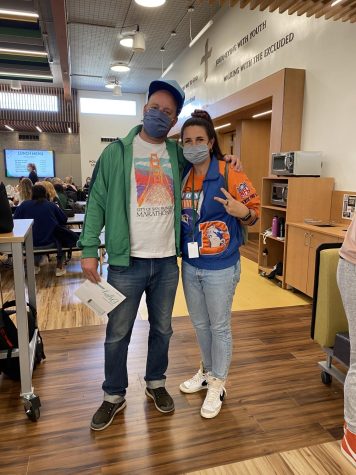 Dr. Exley and Ms. Blumhardt show off their school spirit in the Hollman Family Student Union with killer throwback outfits on Way Back Wednesday. 

