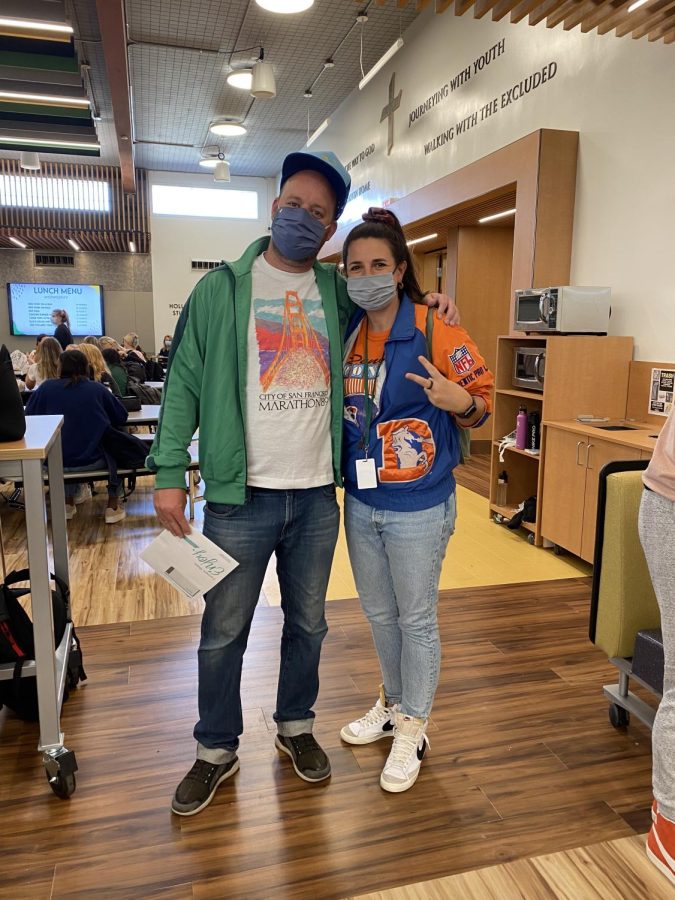 Dr. Exley and Ms. Blumhardt show off their school spirit in the Hollman Family Student Union with killer throwback outfits on Way Back Wednesday. 
