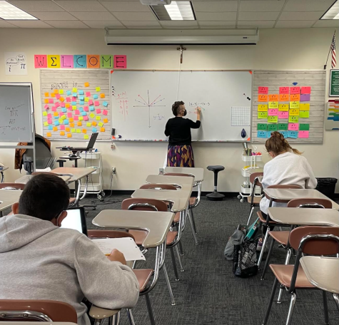 Ms. Schick explains a math problem to her algebra students in-person this year. 