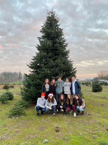Student Government poses in front of Jesuit’s Age Quod Agis worthy Christmas Tree.