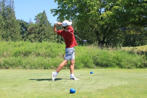 Eastman golfing during the off-season this past summer. 