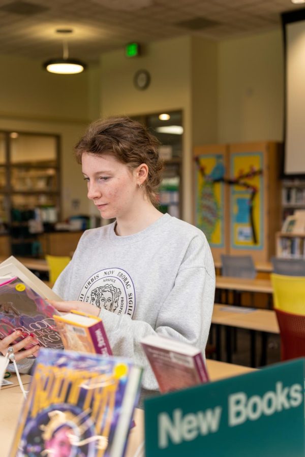 BookTok has enhanced teens like senior Caitlin Thomas’ reading habits.