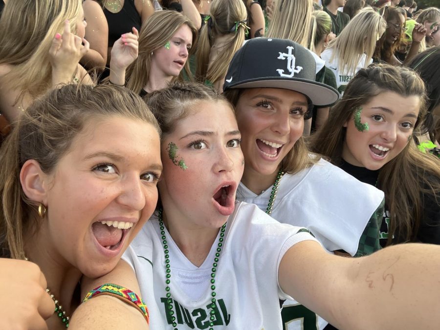 Mia Henninger with her friends at a football game. 
