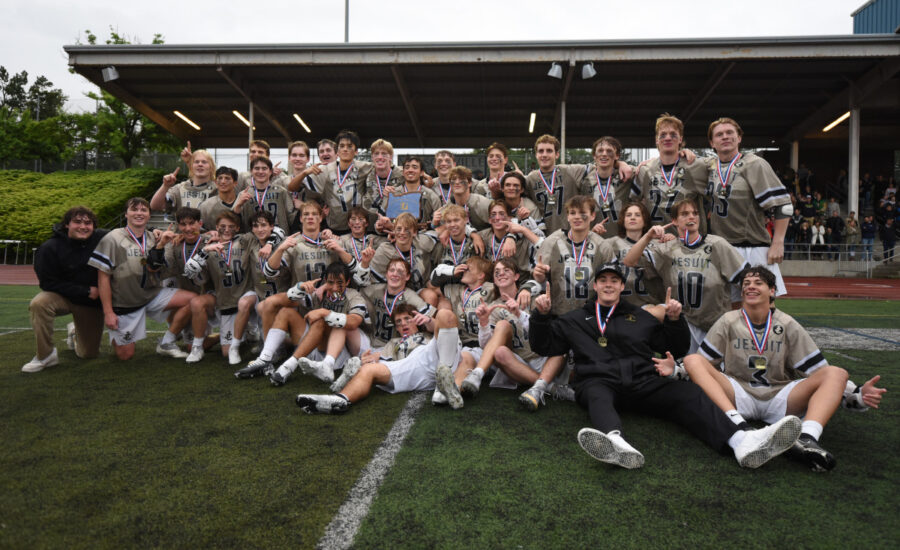 The+Crusaders+celebrate+their+state+championship+win+at+the+end+of+the+2022+season.