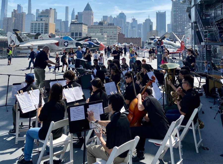 Day 3: Band students perform on the deck of the Intrepid Aircraft Carrier. 
