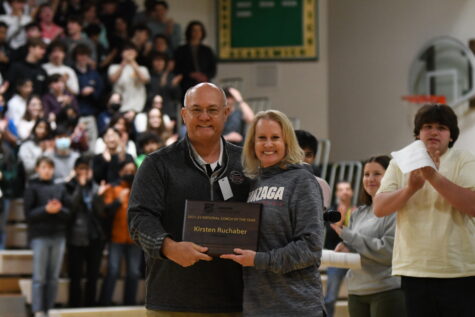 Coach Kirsten Ruchaber receives her National Coach of the Year award at the Winter Sports Conclusion Assembly.