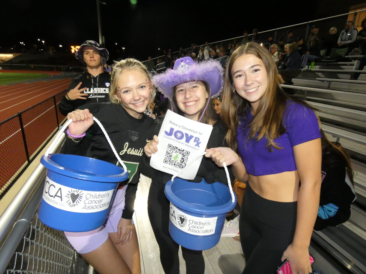 Students+raise+money+last+year+for+the+CCA+walk+at+a+football+game.