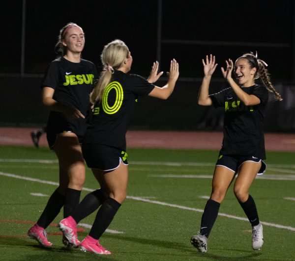 Senior Abby Cox celebrates after scoring a great goal.