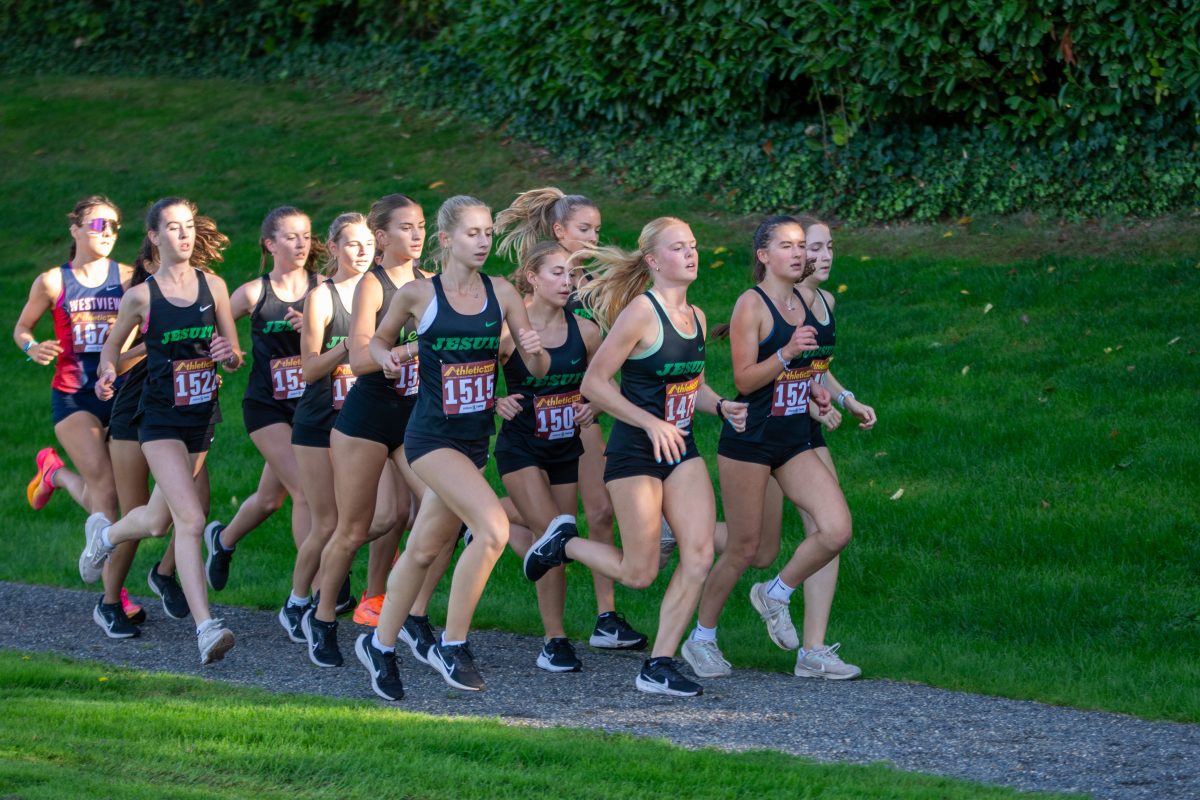 The+womens+XC+team+won+state+in+2023%2C+lead+by+junior+Emma+Bennett.