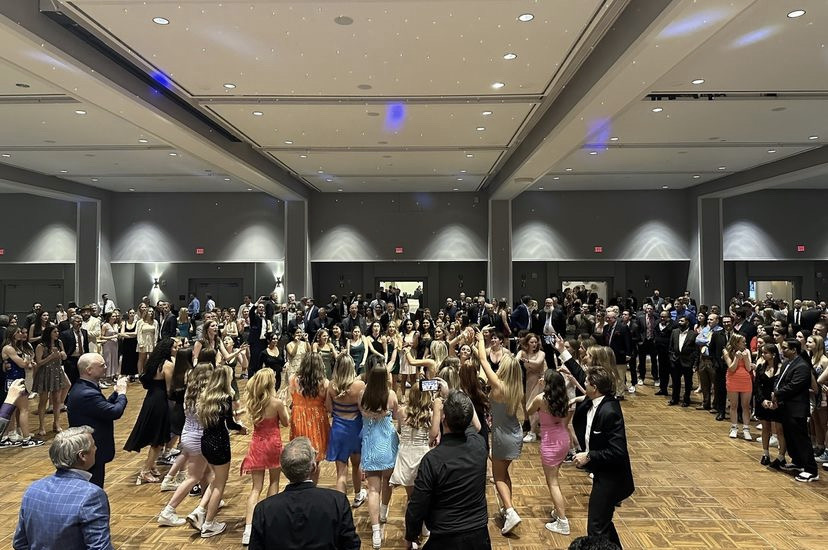 Senior Girls dance to Can’t Stop the Feeling at the annual father-daughter dance.