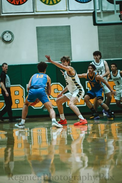 Niko Rafalovich defends against the Barlow Bruins in a game Jesuit won at the last second. 

@regnier.photography.pdx