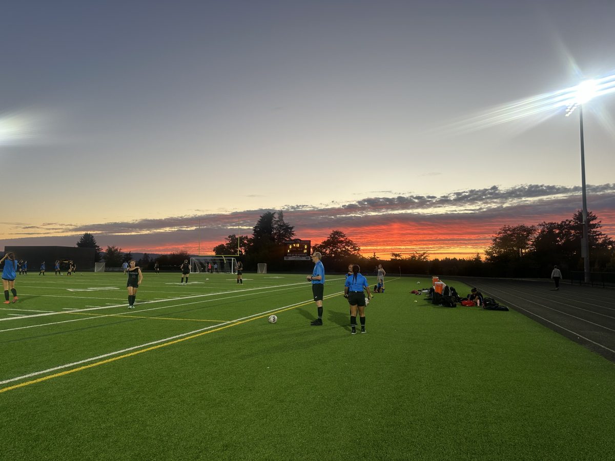 Both teams warming up before their first Metro League match.