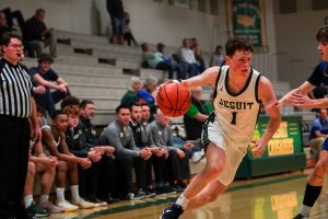 Patrick Kilfoil and Jesuit men's basketball beat Grants Pass in early season action. 