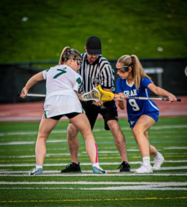 Gigi Abernethy takes a faceoff in a game vs. Grant High School. 