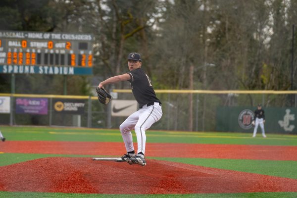 Baseball pitcher Grady Keljo pitches early in the season. 