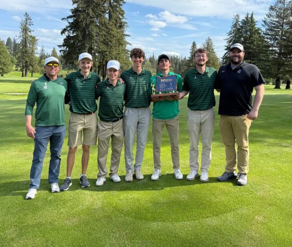 The Jesuit Golf Team holding their trophy after their 28th Metro League title