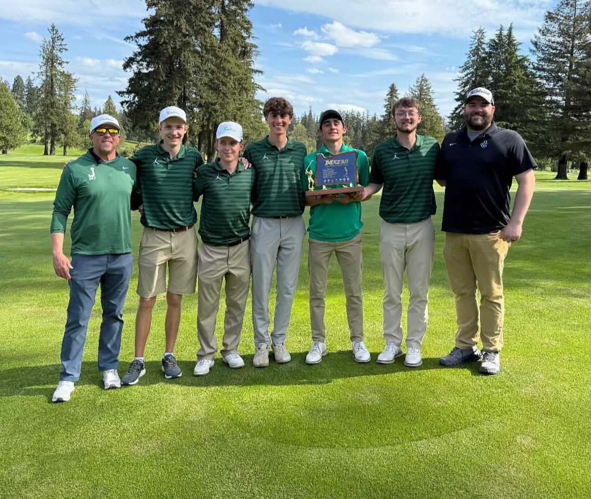 The Jesuit Golf Team holding their trophy after their 28th Metro League title