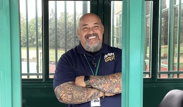 New campus monitor Mr. Perez in his campus safety booth.