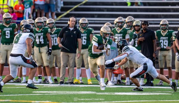 Football earns first win with 34-21 win over Tigard