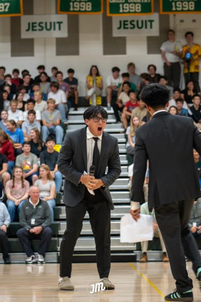 Nathan Bui rallies the crowd along with Jason Pham 