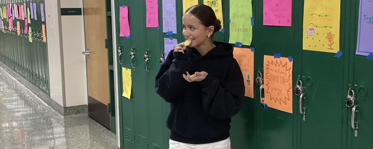 A hungry student sneakily eats in Freshman Hall to avoid a JUG.