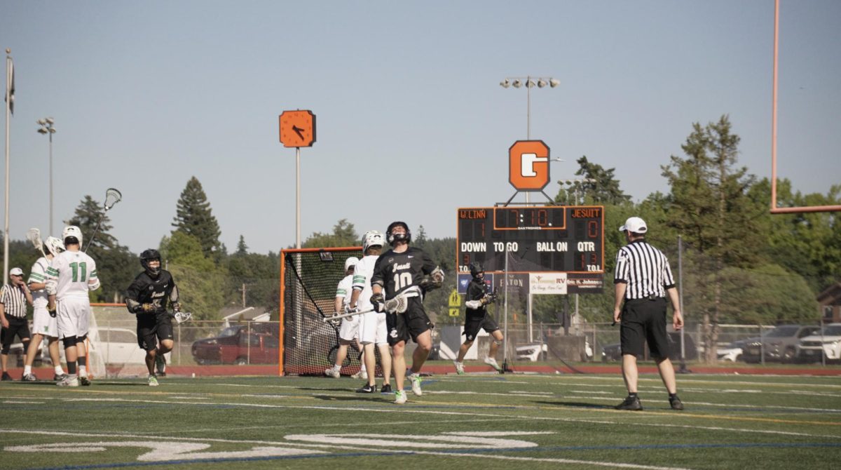 Elliot Hire celebrating his first goal in the Men’s Lacrosse Quarterfinals